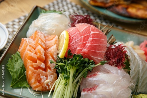 assorted sliced raw fish.