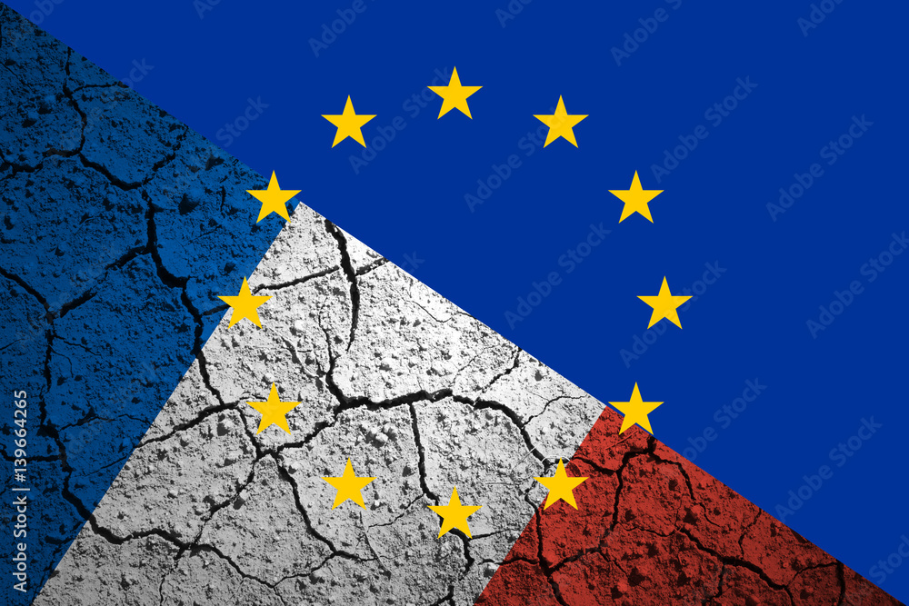 Cracked dry soil ground with painted France flag and Europe Union flag. Conceptual Eu disintegration background.