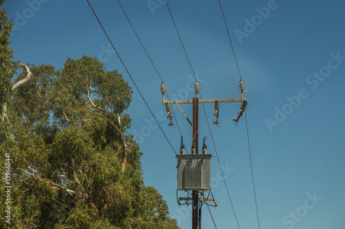 Electricity supply towers and structures transmit power along high voltage wires and cables