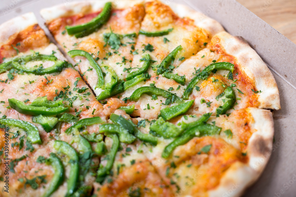 Italian pizza with green pepper in paper box tasty macro picture useful for background Italian pizza with green pepper in paper box tasty macro picture useful for background
