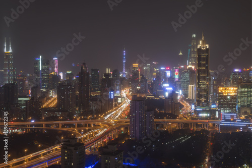 Shanghai, China - March 2, 2017: Shanghai skyline at night with the Shanghai Tower and Shanghai World Financial Center on background