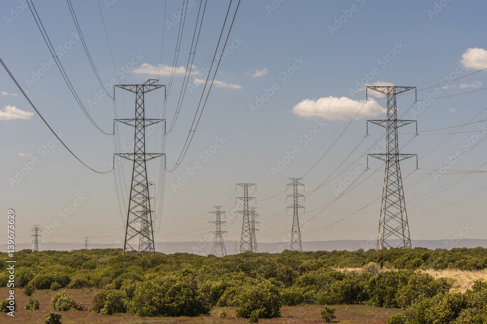 Electricity supply towers and structures transmit power along high voltage wires and cables Electricity supply towers and structures transmit power along high voltage wires and cables