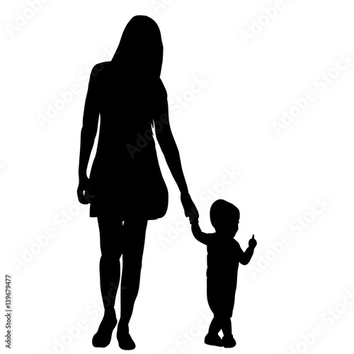  silhouette of mom walking by the hand with the child