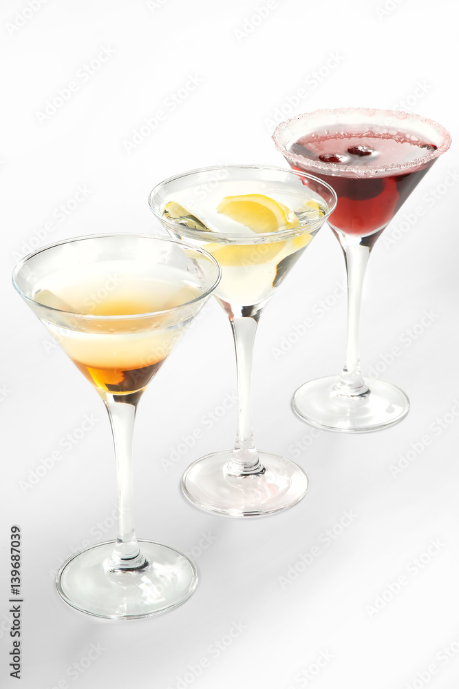 Alcoholic cocktails and soft drinks on a white background Alcoholic cocktails and soft drinks on a white background