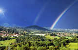 il temporale sul paesino di montagna ,con il doppio arcobaleno