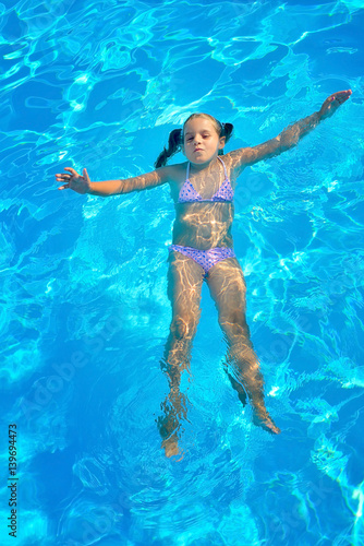 Toddler girl in swimming pool © SuperCoolPhotography