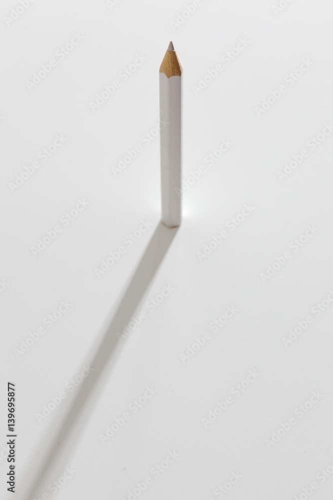 White pencil on white paper with diffused shadow White pencil on white paper with diffused shadow