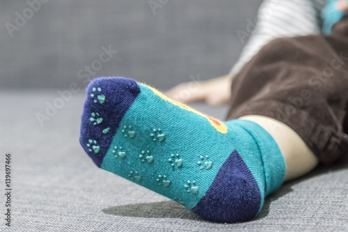 Non-slip socks worn by the child