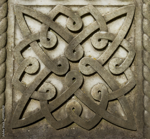 Obraz na plátně stone carved Celtic design symbols background