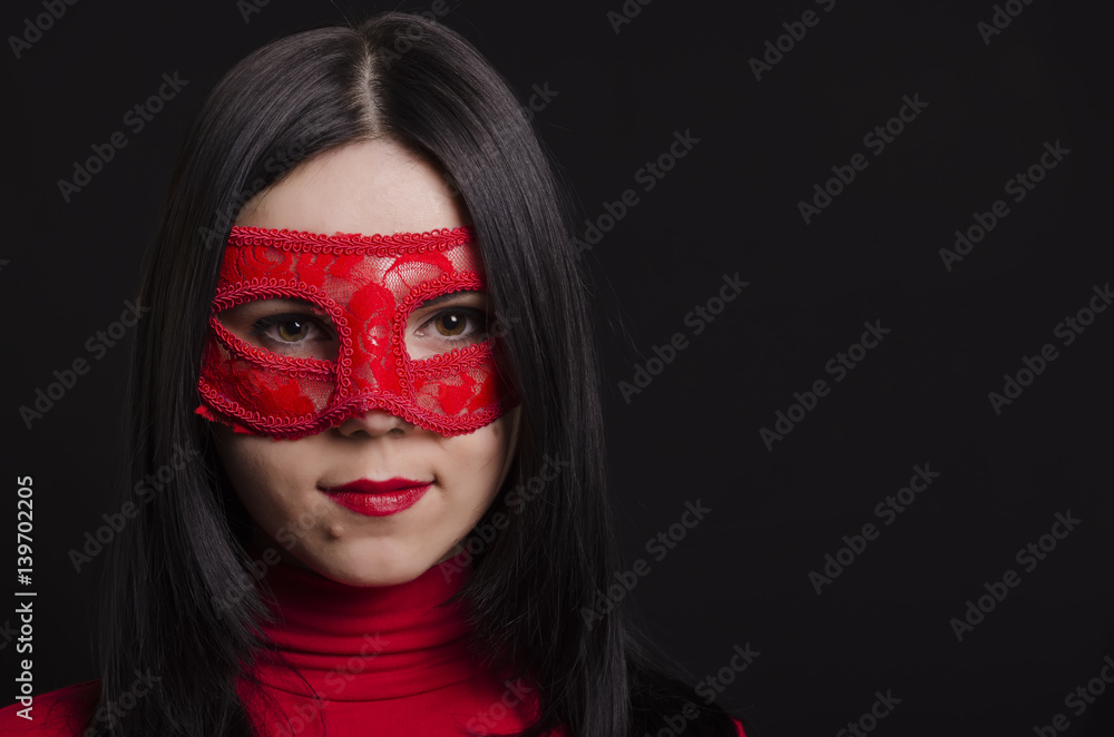 The girl in a carnival mask The girl in a carnival mask