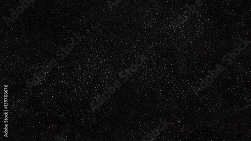 Loopable: Tilting down along tileable pattern of dense realistic starry sky with slowly twinkling stars background.