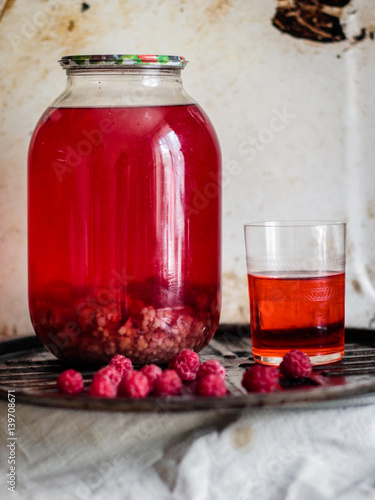 Conserve raspberry drink.