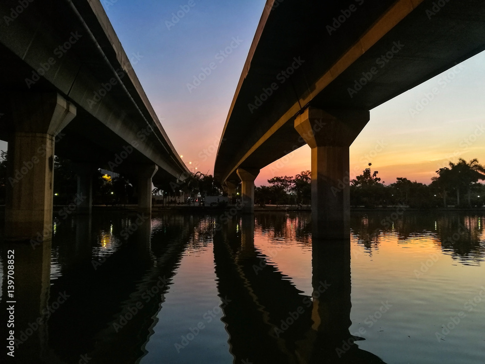Express way with reflection and twilight sky