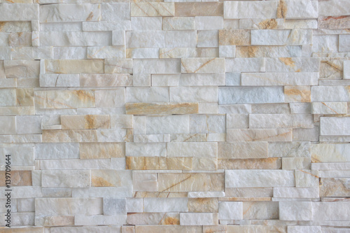 Pattern of grey and rough sandstone wall texture and backgroundม stone Cladding wall