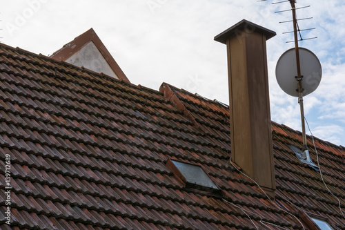European Orange Roof Tiles Chimney Satellite Dish Residential Rooftop Home Design