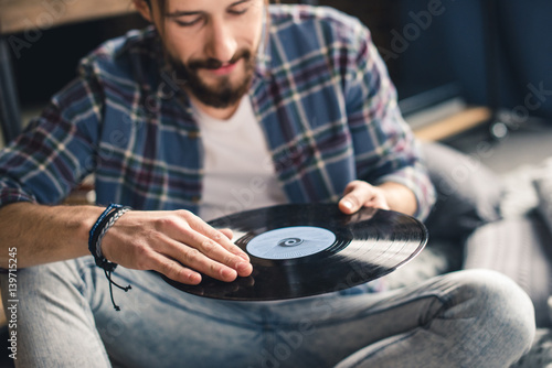 Man holding vinyl record