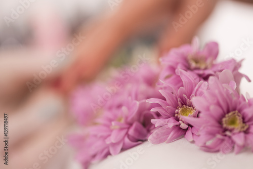 Woman hands receiving a manicure