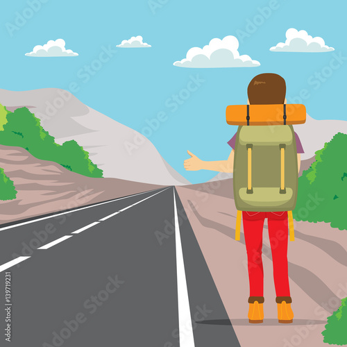 Back view of man doing hitchhiking standing on road side