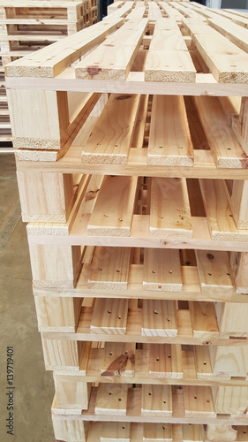 new condition of brown wooden pallets for product distribution and transportation in warehouse