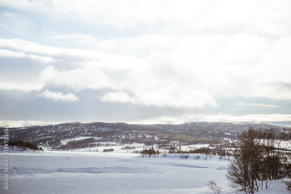A beautiful landscape of a snowy Norwegian winter day A beautiful landscape of a snowy Norwegian winter day