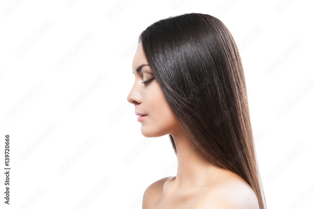 Attractive topless woman with long brunette hair looking down isolated on white. Attractive topless woman with long brunette hair looking down isolated on white.