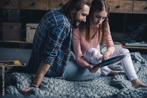 Couple with vinyl record photo