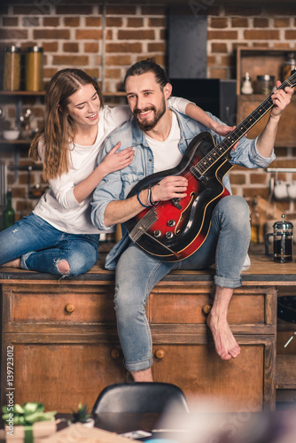 Young couple with guitar