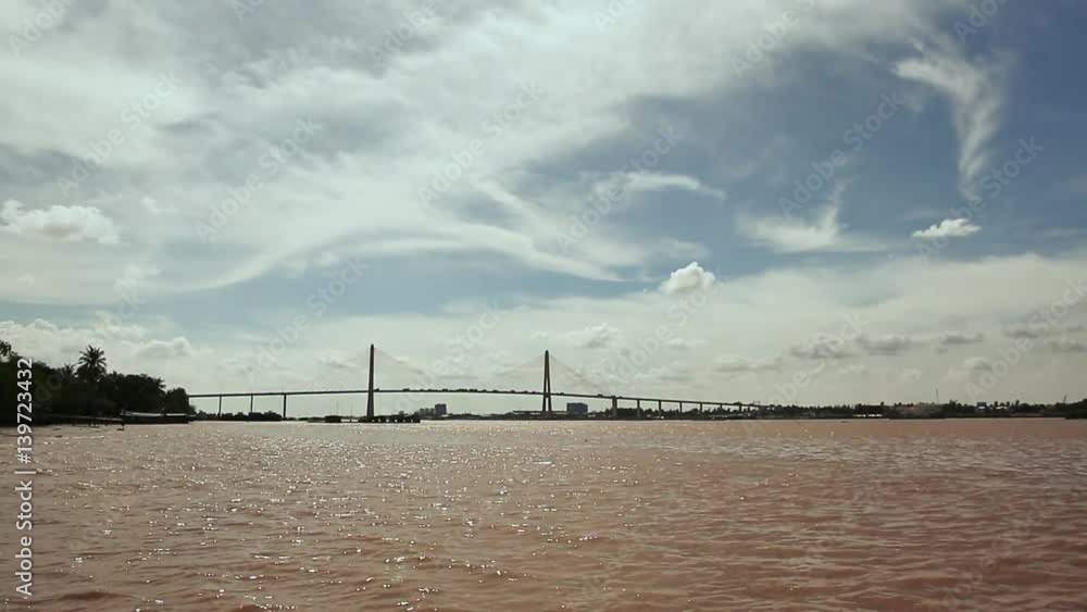 Bridge on the broad Mekong River. Shooting on the move. Vietnam. Bridge on the broad Mekong River. Shooting on the move. Vietnam.