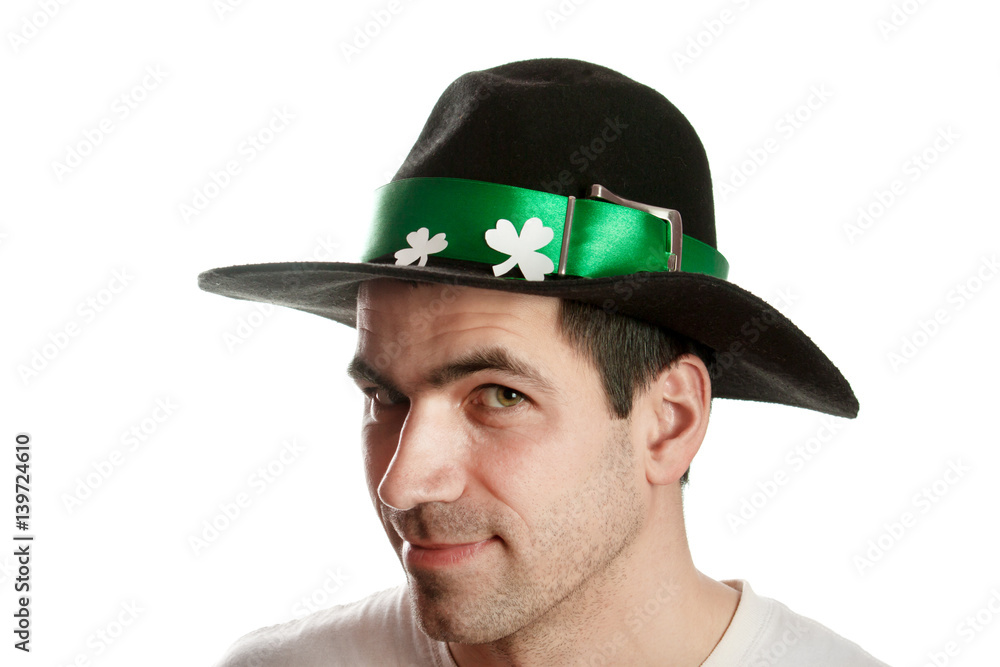Man in Patrick's Day hat with green drink