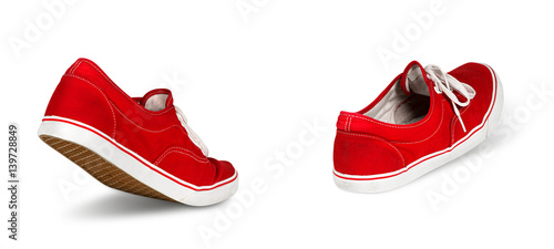 empty red ghost shoe sneaker walking away isolated on white background / Geisterschuhe rot laufen gehen isoliert