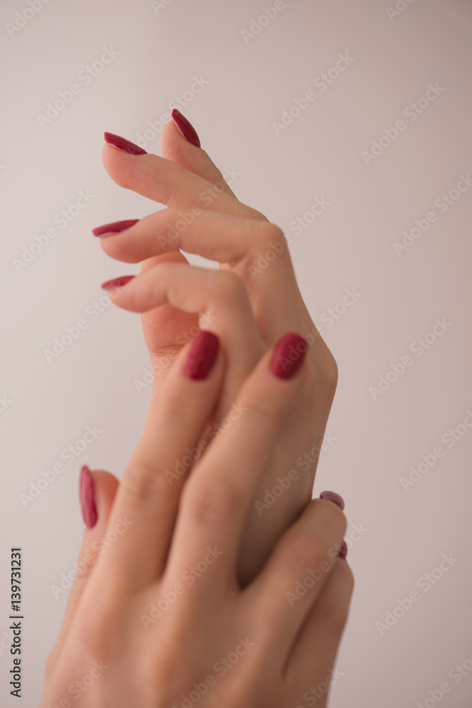 closeup of hands of a young woman closeup of hands of a young woman