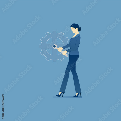 Business woman fixes a giant cog