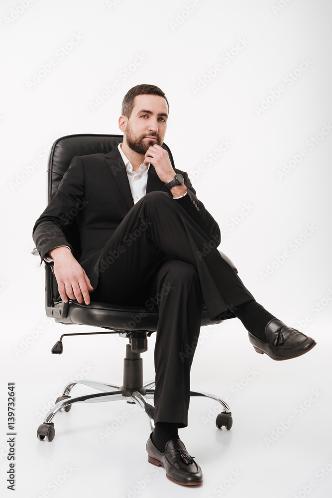 Handsome businessman over white background Handsome businessman over white background