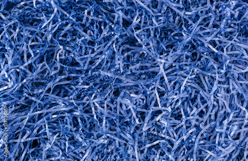 Shredded blue paper background
