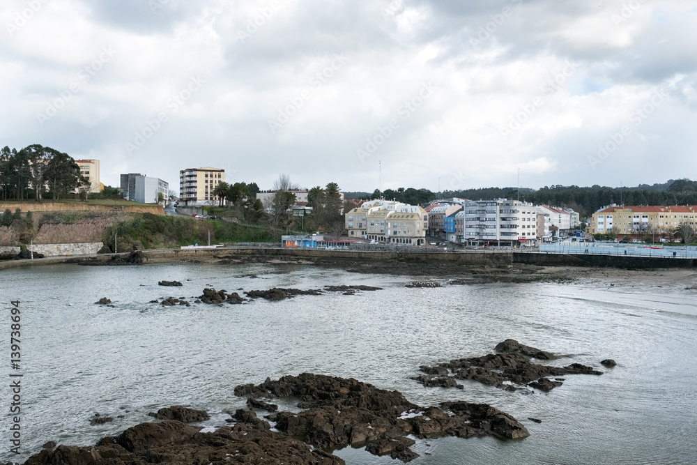 Different views of a beach from a summer resort in La Coruna bay on a good day in winter. Galicia, Spain