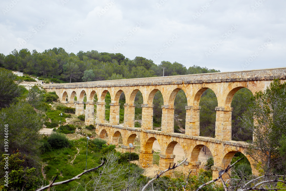 Ancient Roman aqueduct. Spain
