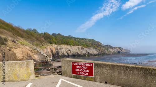 Sign at Sandsend Beach, near Whitby, North Yorkshire, UK photo