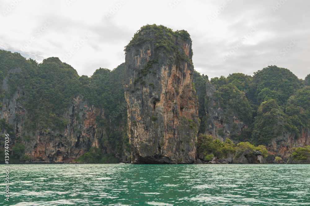 Rock islands on the way to Railay beach in Krabi province, Thailand Rock islands on the way to Railay beach in Krabi province, Thailand