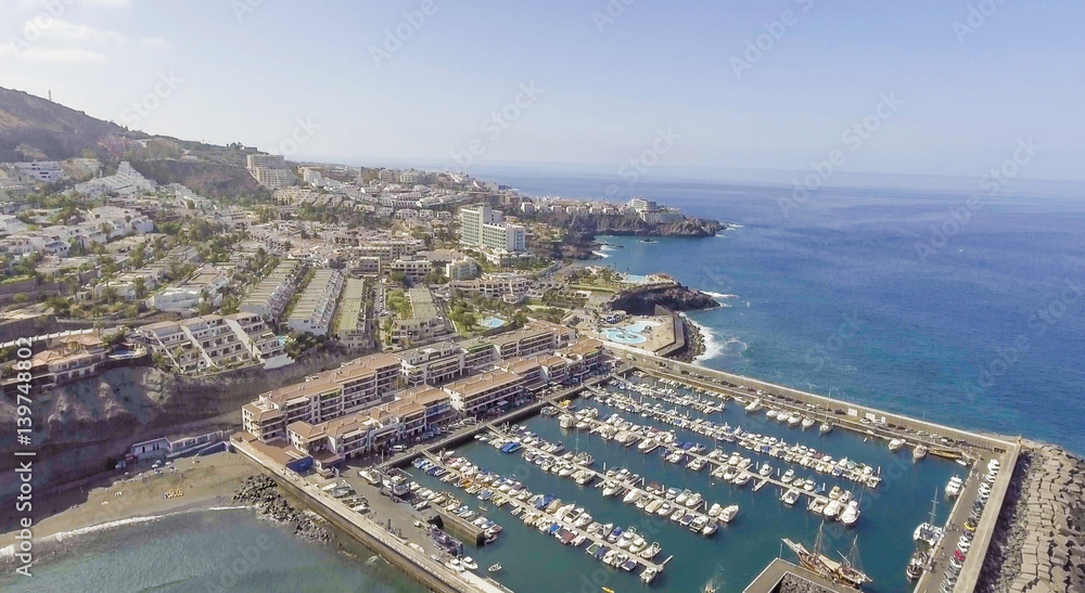 Aerial coastal view of port and small boats