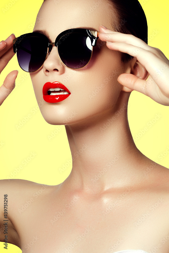 Beautiful young model with big sunglasses close-up Beautiful young model with big sunglasses close-up