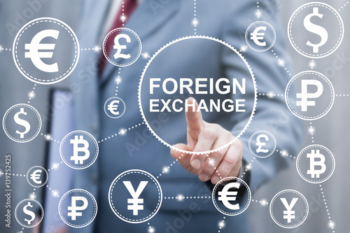 Foreign exchange financial business concept. Businessman touched external currency word icon on virtual screen. Finance trade and stock market technology