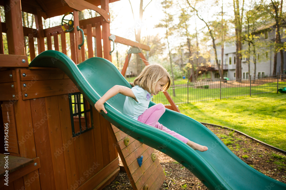 Senior Woman Sliding Down Slide At Playground Portrait High-Res Stock Photo  - Getty Images