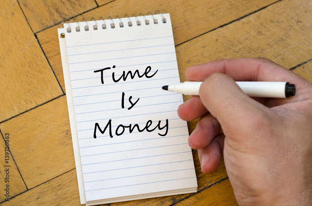 Time is money concept on notebook Time is money concept on notebook