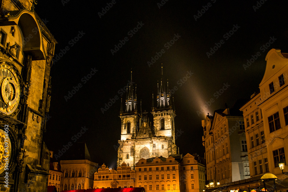 Famous Tyn Cathedral Twin Tower at night illuminated on Prague Town Square Czech Republic Europe