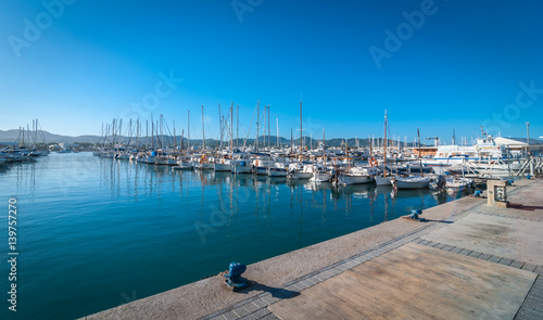 Sailboats & pleasure craft moored.  Morning in the harbor of Sant Antoni de Portmany, Ibiza town, Balearic Islands, Spain. © valleyboi63