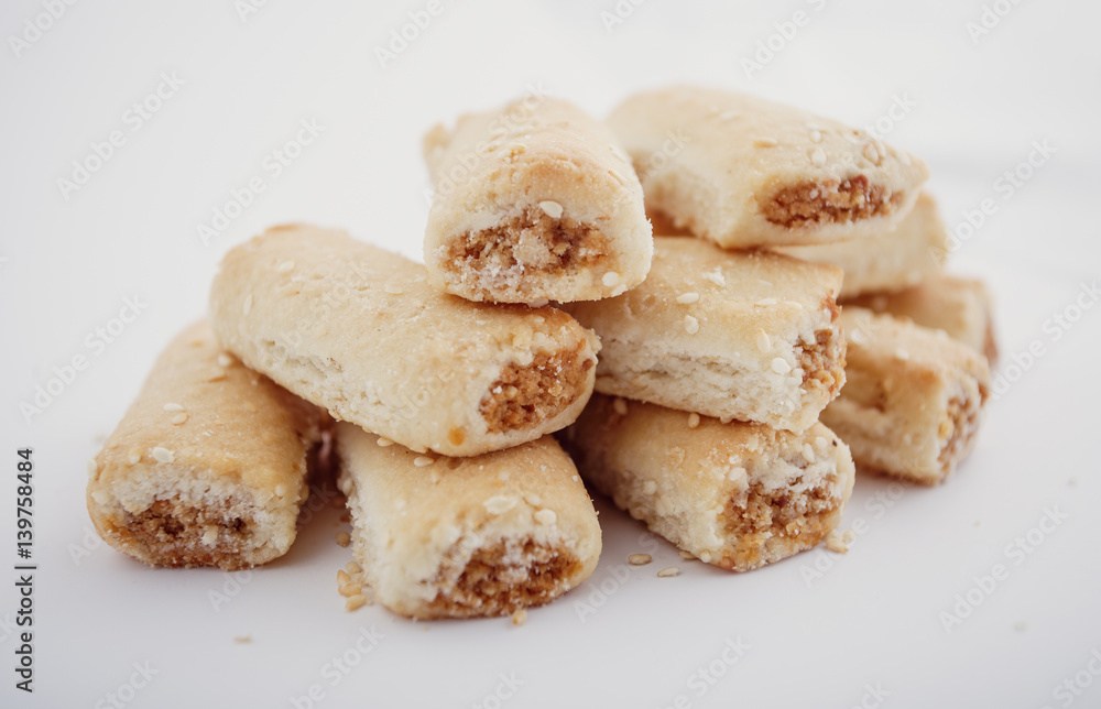 Arabian Eid dates sweets isolated. Oriental sweets with honey and nuts. Turkish Pakhlava Isolated On White. Turkish dessert.