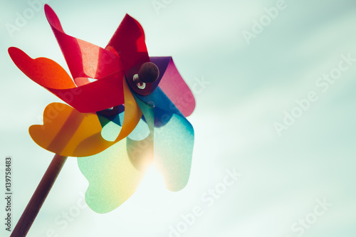 Windmill toy at sunset