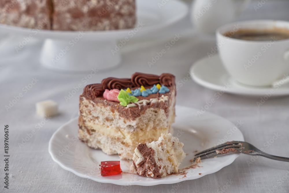 Delicious dessert cake with chocolate cream and coffee Delicious dessert cake with chocolate cream and coffee
