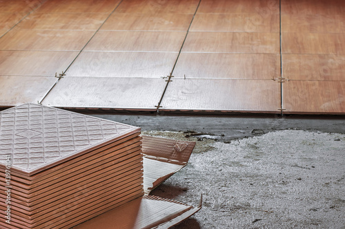 Building, indoor work laying of floor tiles