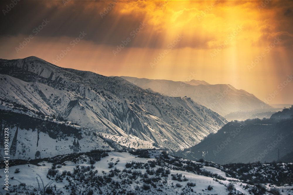 Beautiful sunset in the winter mountains